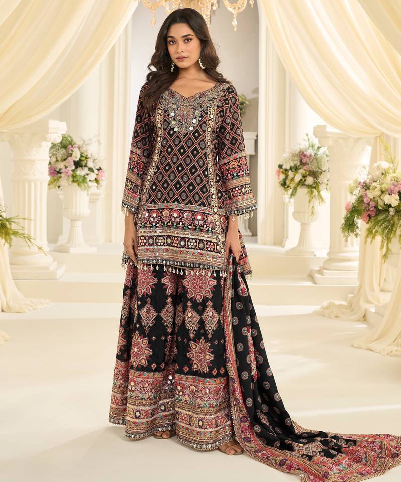 Designer salwar kameez in crepe silk with digital print & aari work