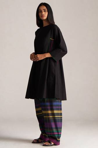 black co-ord set with multi colour checkered pants