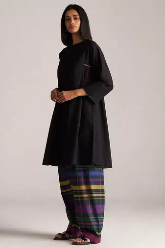 black co-ord set with multi colour checkered pants