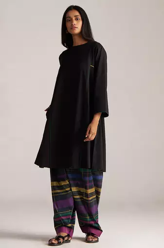 black co-ord set with multi colour checkered pants