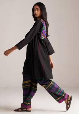 black co-ord set with multi colour checkered pants 3