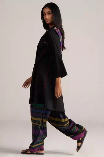 black co-ord set with multi colour checkered pants