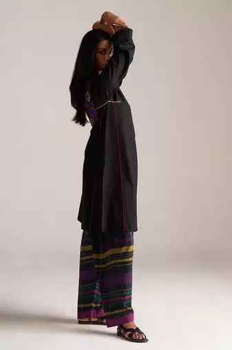black co-ord set with multi colour checkered pants