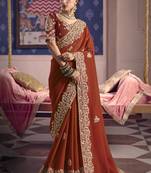 red embroidered silk wedding saree