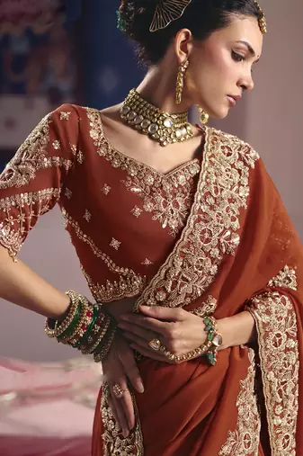 red embroidered silk wedding saree