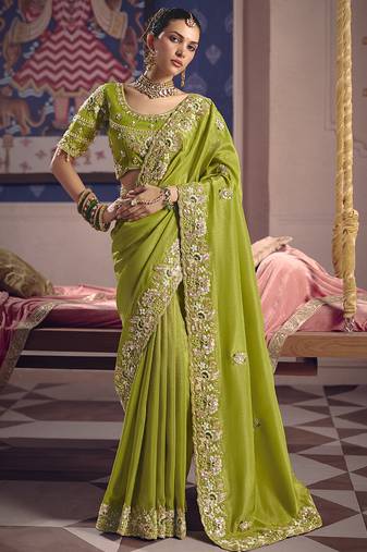 Parrot green silk embroidered wedding wear saree