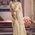 Cream silk embroidered wedding wear saree