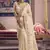 cream embroidered silk wedding saree