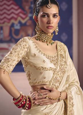 cream embroidered silk wedding saree 2