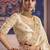 Cream silk embroidered wedding wear saree