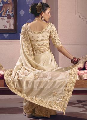cream embroidered silk wedding saree 3