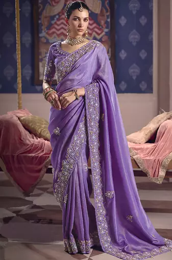 Purple silk embroidered wedding wear saree