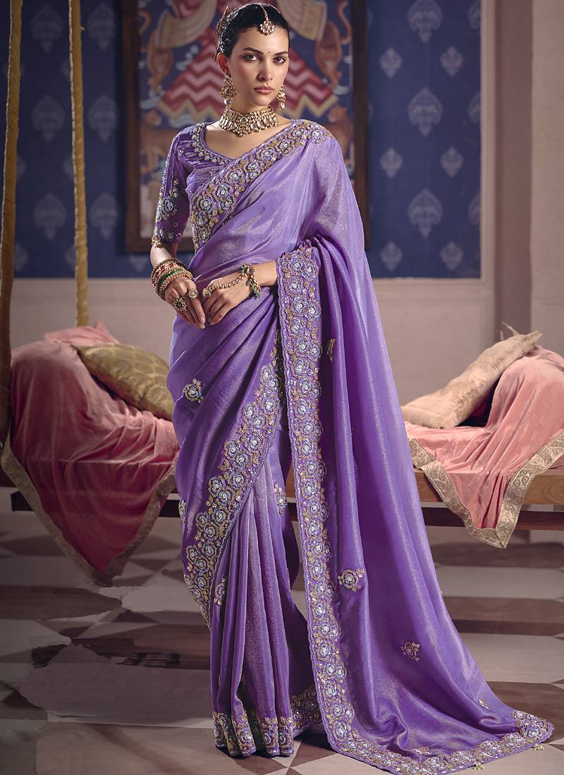 Purple silk embroidered wedding wear saree