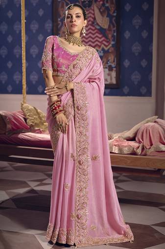 Light pink silk embroidered wedding wear saree