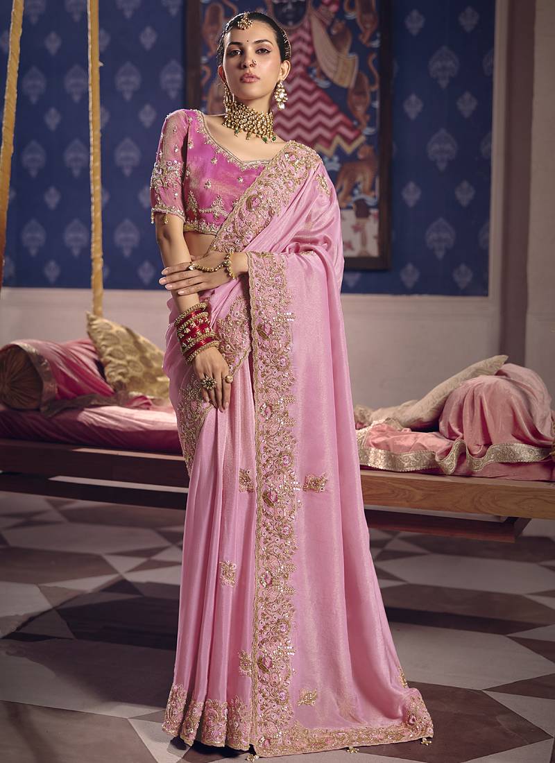 Light pink silk embroidered wedding wear saree