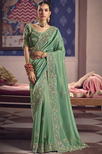 Dark green silk embroidered wedding wear saree