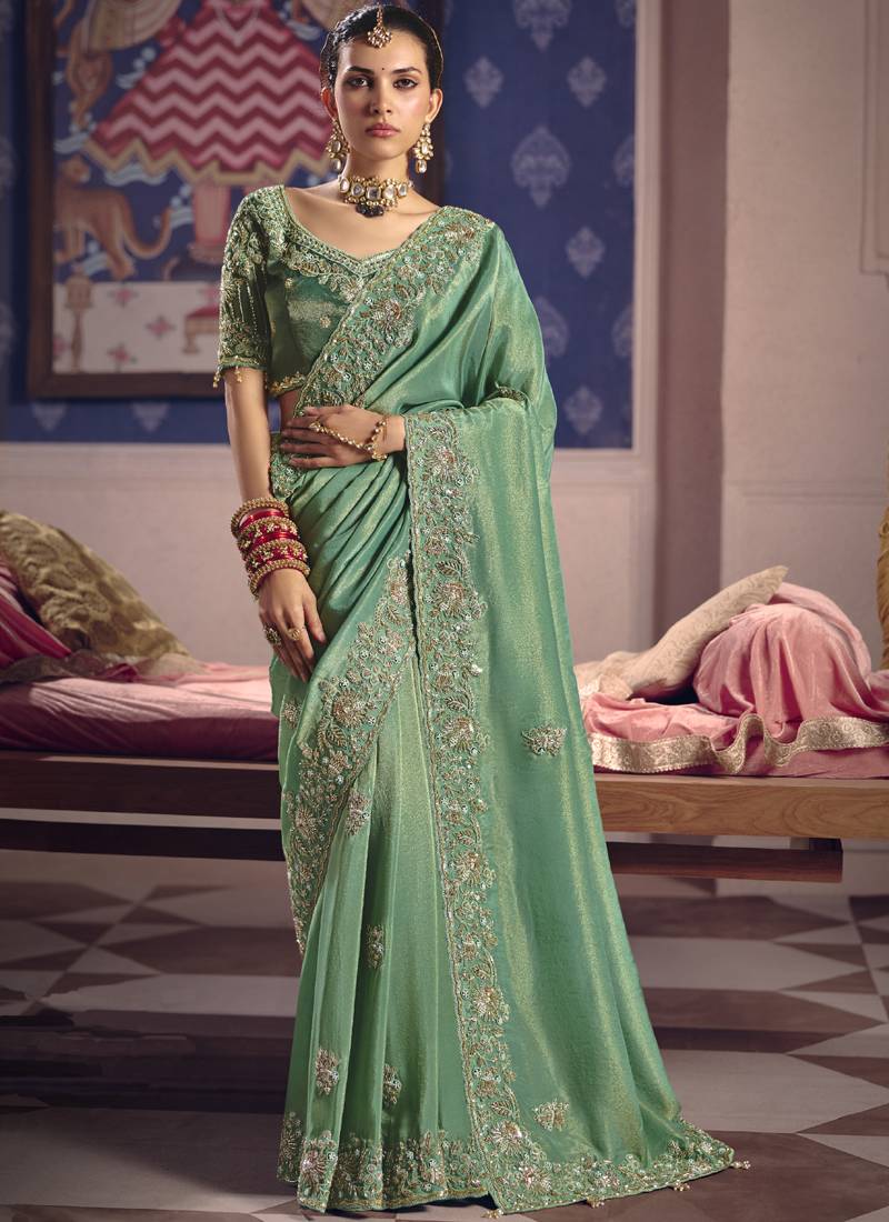 Dark green silk embroidered wedding wear saree