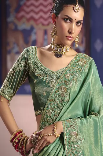 dark green embroidered silk wedding saree