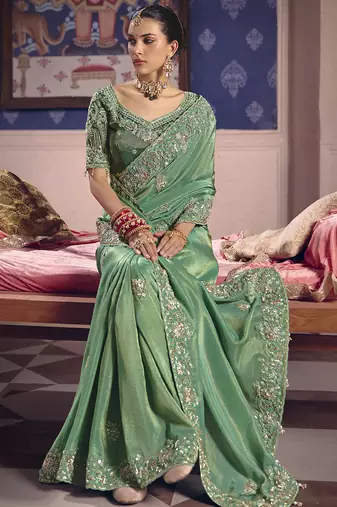 dark green embroidered silk wedding saree