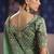 Dark green silk embroidered wedding wear saree