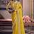 Yellow silk embroidered wedding wear saree