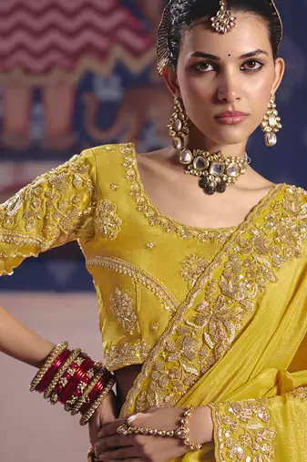 yellow embroidered silk wedding saree