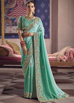 turquoise embroidered silk wedding saree 1