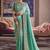 Turquoise silk embroidered wedding wear saree