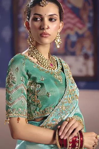 turquoise embroidered silk wedding saree