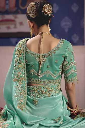 turquoise embroidered silk wedding saree