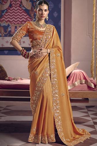 Orange silk embroidered wedding wear saree