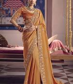 orange embroidered silk wedding saree