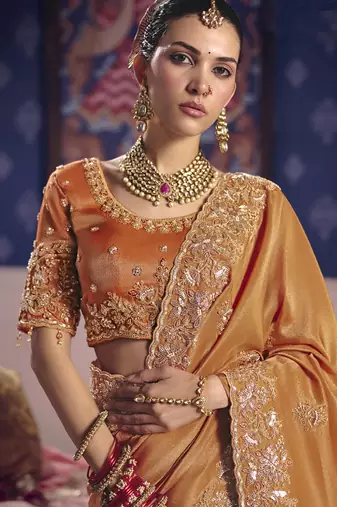 orange embroidered silk wedding saree