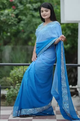 Blue Color Embroidered Lace Border with Real Mirror Work Faux Georgatte Saree