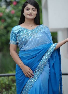 Blue Color Embroidered Lace Border with Real Mirror Work Faux Georgatte Saree 5