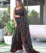 Black block print soft pure cotton saree with blouse.