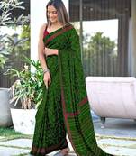 Green block print soft pure cotton saree with blouse.