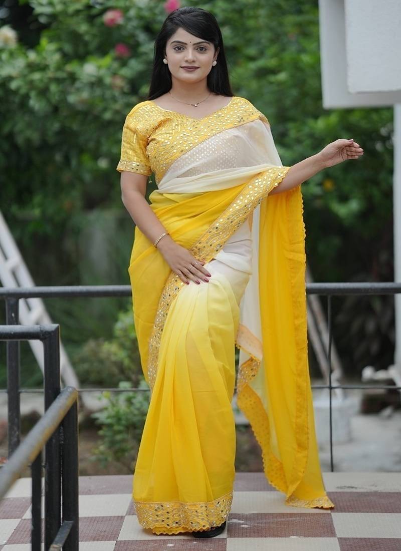 Yellow Color Embroidered Lace Border with Real Mirror Work Faux Georgatte Saree