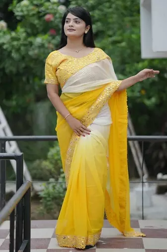 Yellow Color Embroidered Lace Border with Real Mirror Work Faux Georgatte Saree