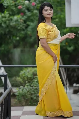 Yellow Color Embroidered Lace Border with Real Mirror Work Faux Georgatte Saree