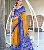 Mustard, blue batik print soft pure cotton saree with blouse.