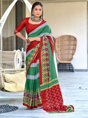 Green ikkat print soft pure cotton saree with blouse. 1
