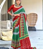Green ikkat print soft pure cotton saree with blouse.