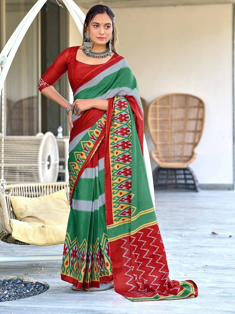 Green ikkat print soft pure cotton saree with blouse.