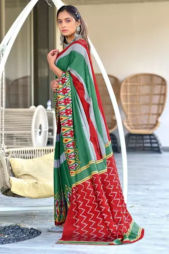 Green ikkat print soft pure cotton saree with blouse.