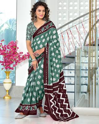 Light green ikkat print soft pure cotton saree with blouse. 1