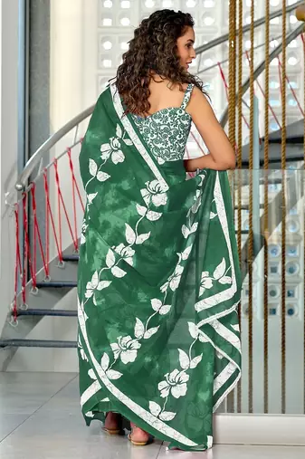Green floral print soft pure cotton saree with blouse.