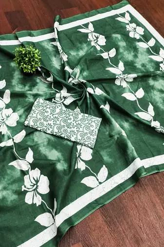 Green floral print soft pure cotton saree with blouse.