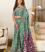 Green floral print soft pure cotton saree with blouse.