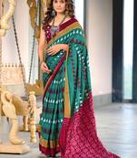 Teal blue ikkat, block print mulmul cotton saree with blouse.